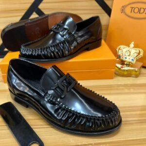 Tod’s Black Patent Leather Loafers
